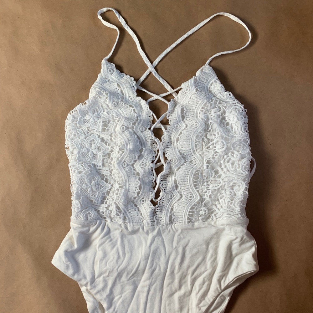 white crochet body suit w lace up detail
